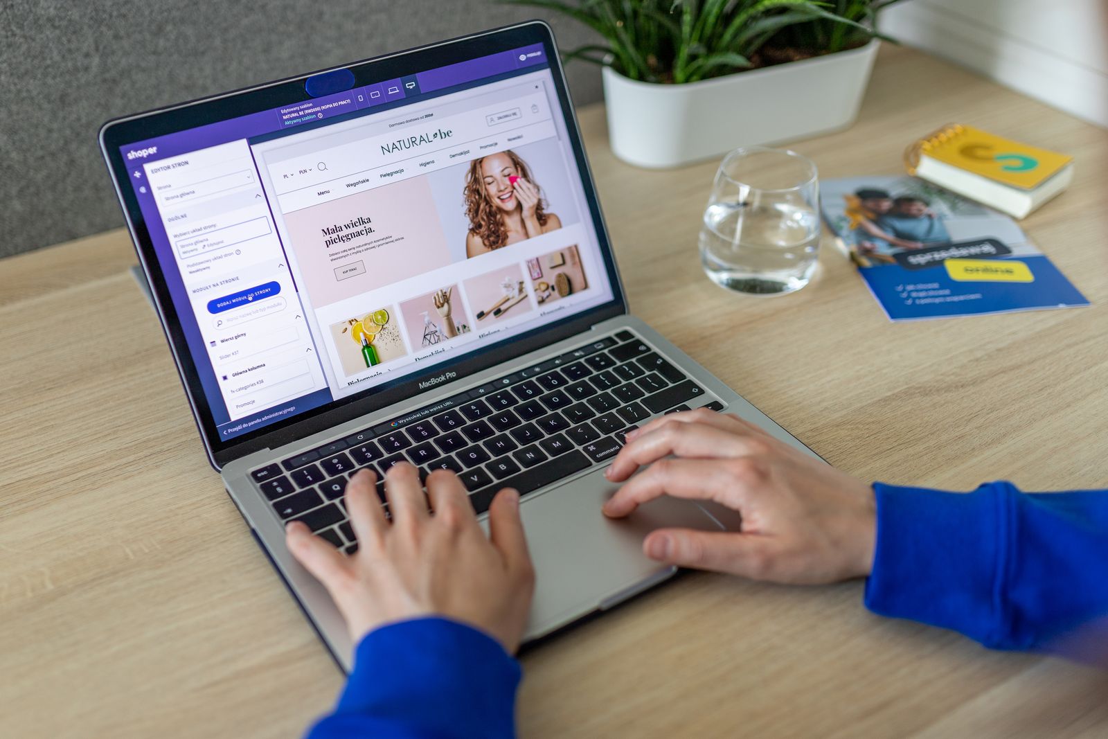 Web designer working on a website mockup on a laptop